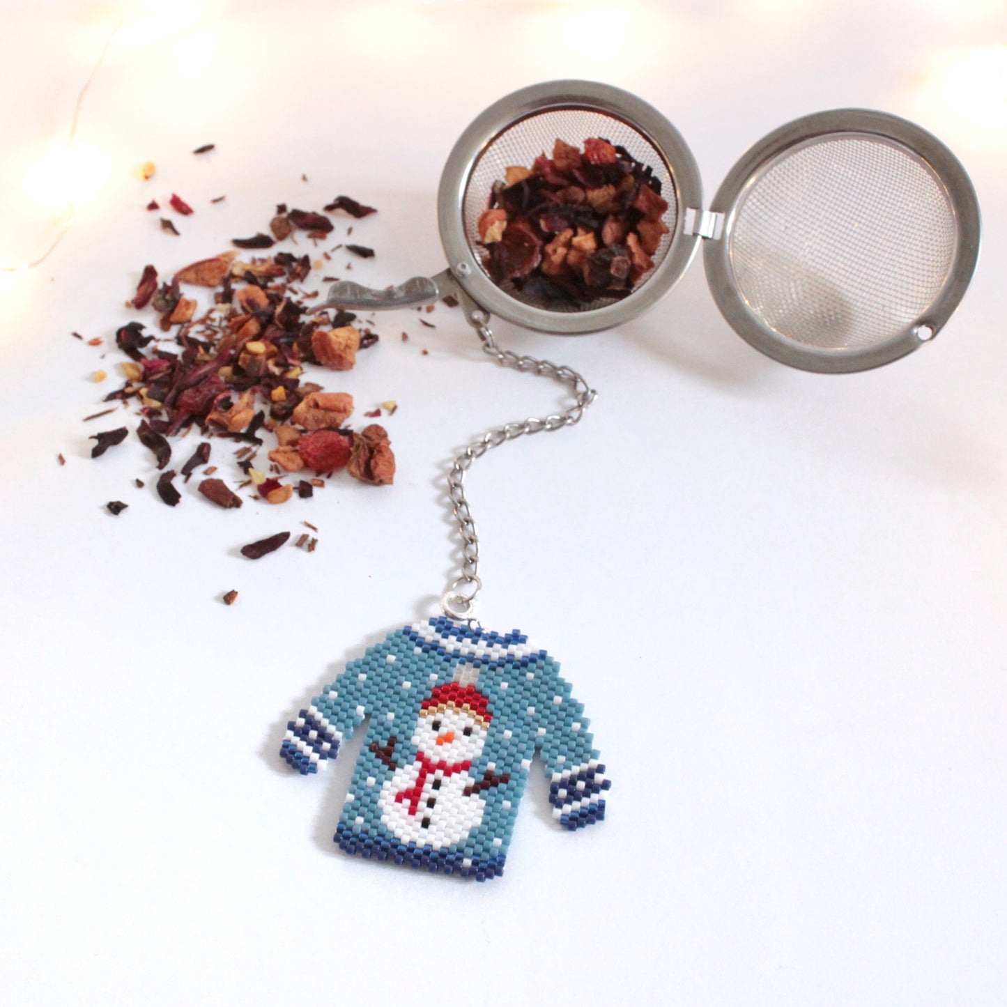 Filtro tè con maglioncino Pupazzo di Neve