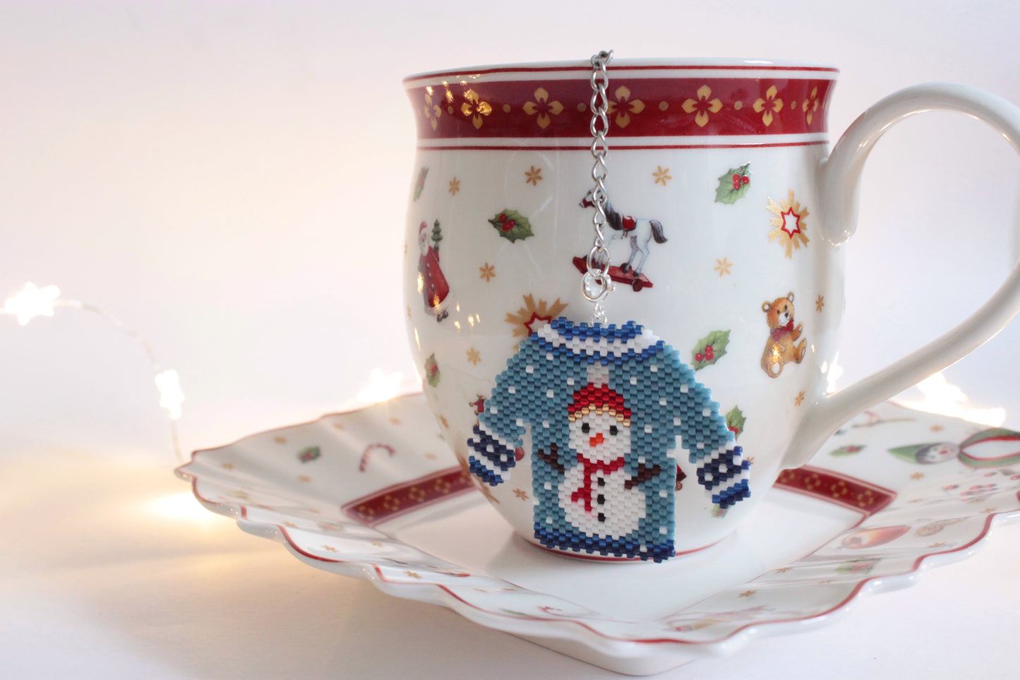 Filtro tè con maglioncino Pupazzo di Neve